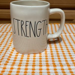 Rae Dunn mug with “Strength” text